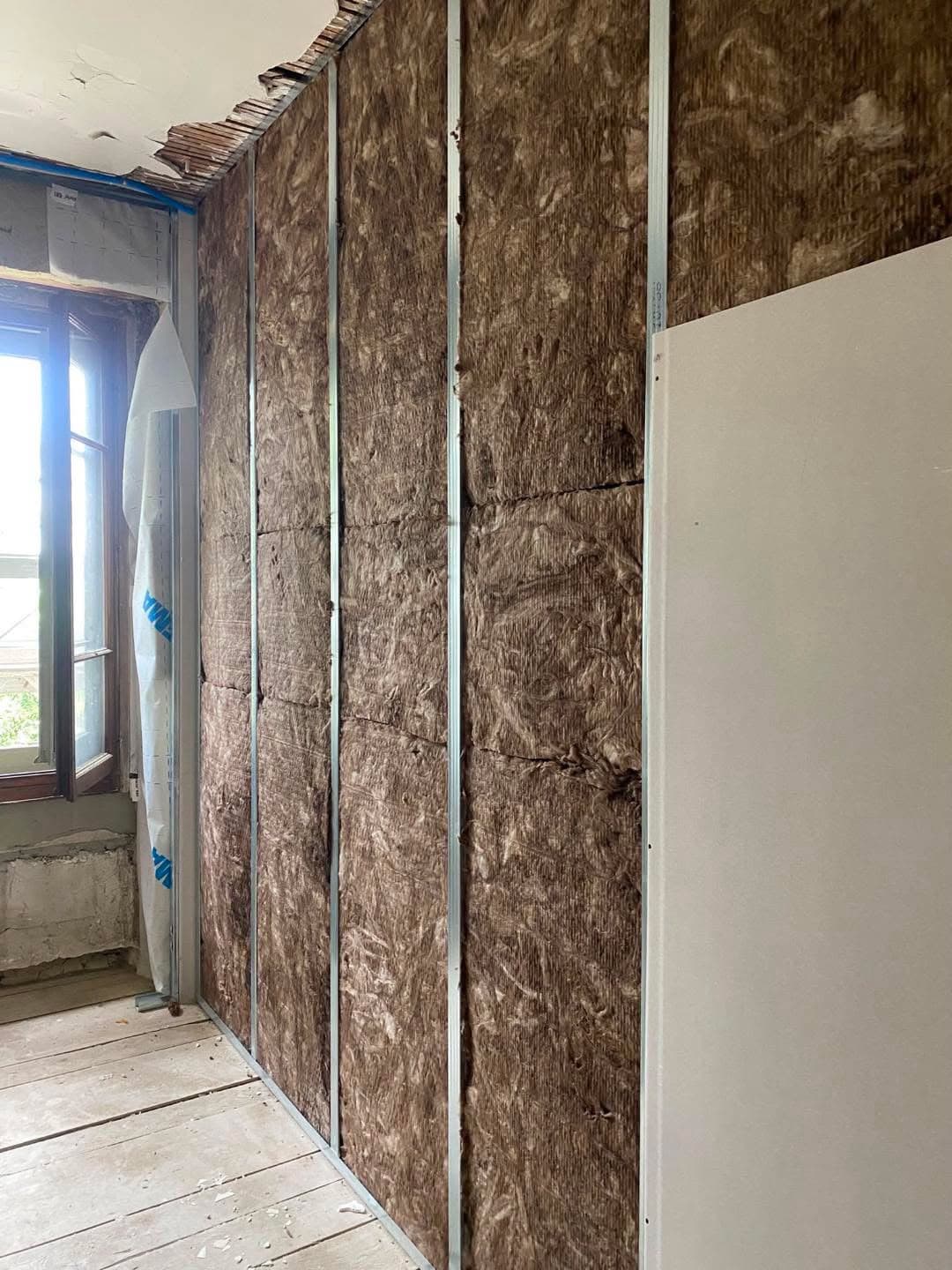 Mur ouvert avant reconstruction